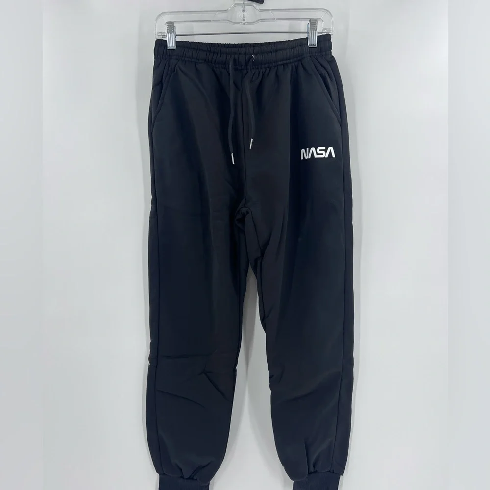 SHEIN MEN’s NASA joggers are fleece-lined. Medium